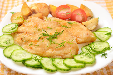 Fried fish fillet with vegetables