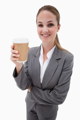 Portrait of a businesswoman holding a takeaway coffee