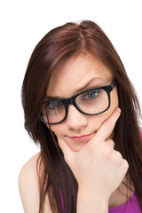 Fototapeta premium Close up on thinking brunette with glasses