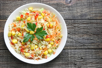 Salad with cabbage, carrots,sweet corn and paprika