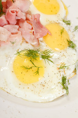 fried eggs with bacon