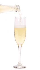 Champagne pouring in a glass.