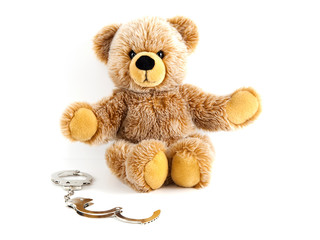 Teddybär mit Handschellen