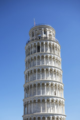 Leaning Tower of Pisa against a clear blue sky