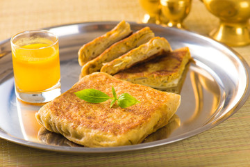 Oriental pizza plate of traditional Arabic food manaqish.