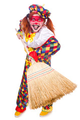 Clown with broom isolated on white