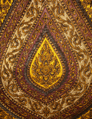 Old art pattern on the fabric bakground