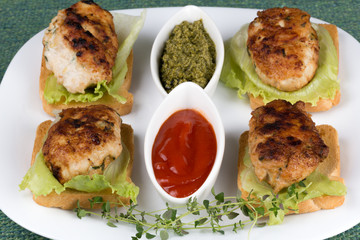 Fried cutlets with bread and vegetables
