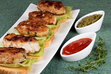 Fried cutlets with bread and vegetables
