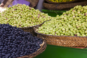 Black and green olives in the market for sell