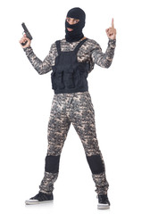 Soldier in camouflage with gun on white