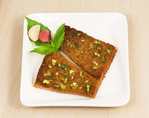 bread fried in oil with garlic