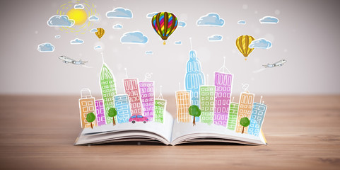cityscape drawing on open book