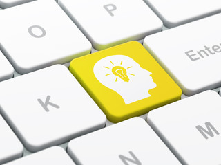 Marketing concept: Head With Light Bulb on computer keyboard bac