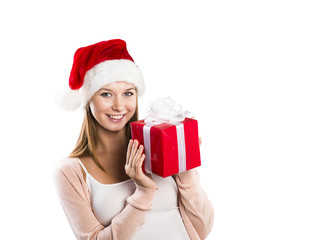 Beautiful christmas woman with gift