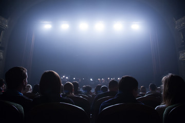 Spectators wait for the start of the concert.