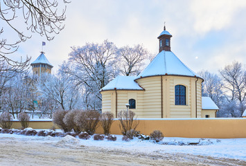 Old chapel and the bishop's castle in Pultusk. Winter landscape.