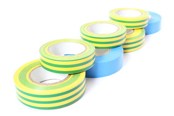 Multicolored insulating tapes on white background