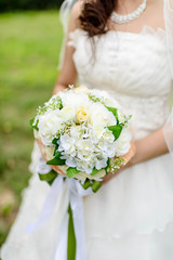Wedding flowers in bride hand