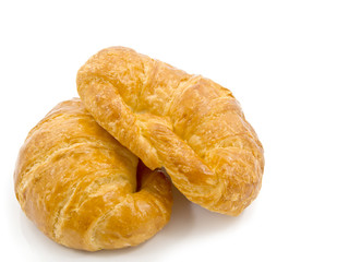 fresh french croissant on white background
