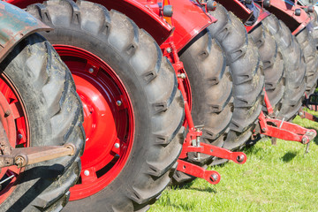 Obraz premium Rear view row of tractor wheels