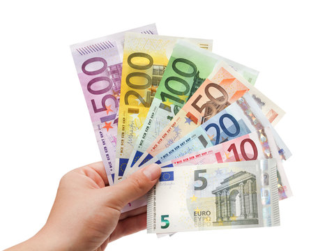 euro banknotes in hand on white￼