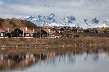 A view of Ushuaia, Tierra del Fuego. Boats line the harbor in Us