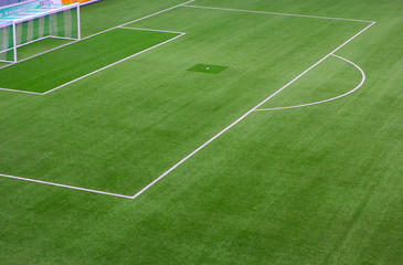 The field goal kicking a football field.