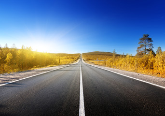 road in north mountains in autumn time