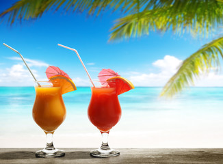 Two fresh juices on beach