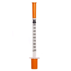 New syringe with orange cap isolated. Injection