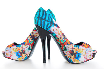 Beautiful multicolored stiletto shoes on white