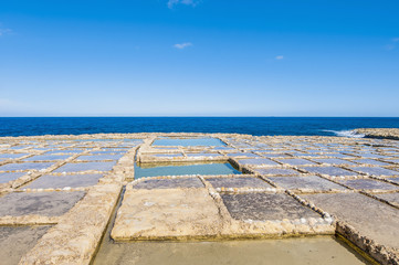 Salt pans near Qbajjar in Gozo, Malta.