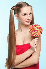 Young woman with lollipop