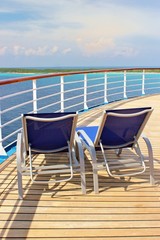  Lounge chairs on a cruise ship deck  - 57115430