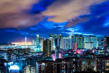 Tuinposter Urban city in Hong Kong at night © leungchopan
