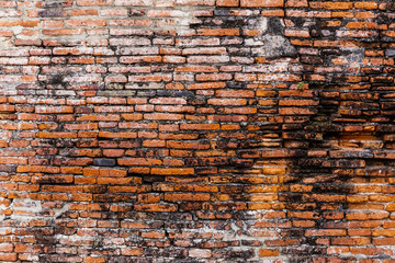 Ancient brick wall in red color