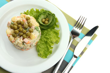 Russian traditional salad Olivier, isolated on white