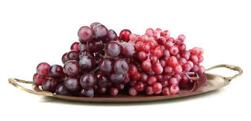 Golden tray with grape isolated on white