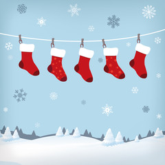 christmas stockings in winter landscape