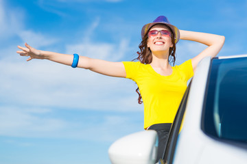 Young woman got out of car window