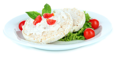 Tasty crispbreads with vegetables, isolated on white