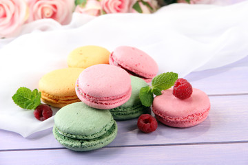 Gentle macaroons on table close-up