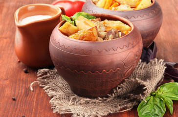Homemade beef stir fry with vegetables in pots