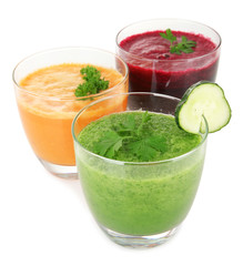 Fresh vegetable juices isolated on white