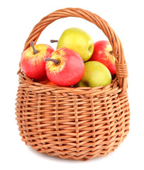 Small apples in wicker basket, isolated on white
