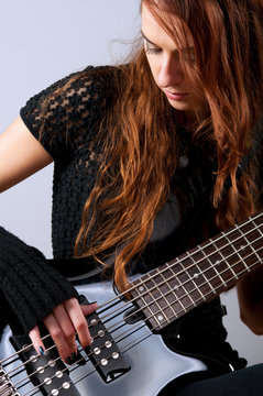 Beautiful Girl Playing Bass Guitar