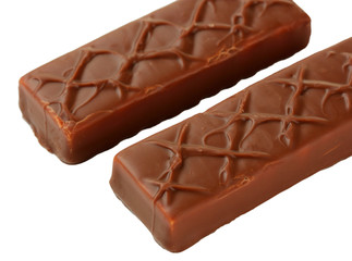 Two delicious chocolate bars isolated on white