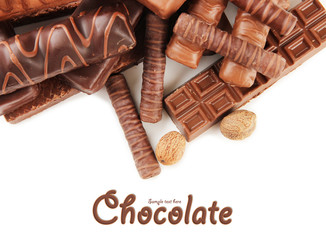 Delicious chocolate bars with nuts close up