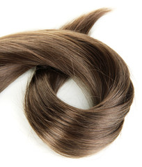 Shiny brown hair isolated on white